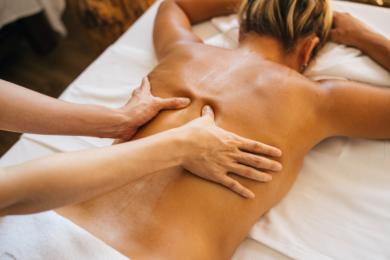 woman getting massage along spine